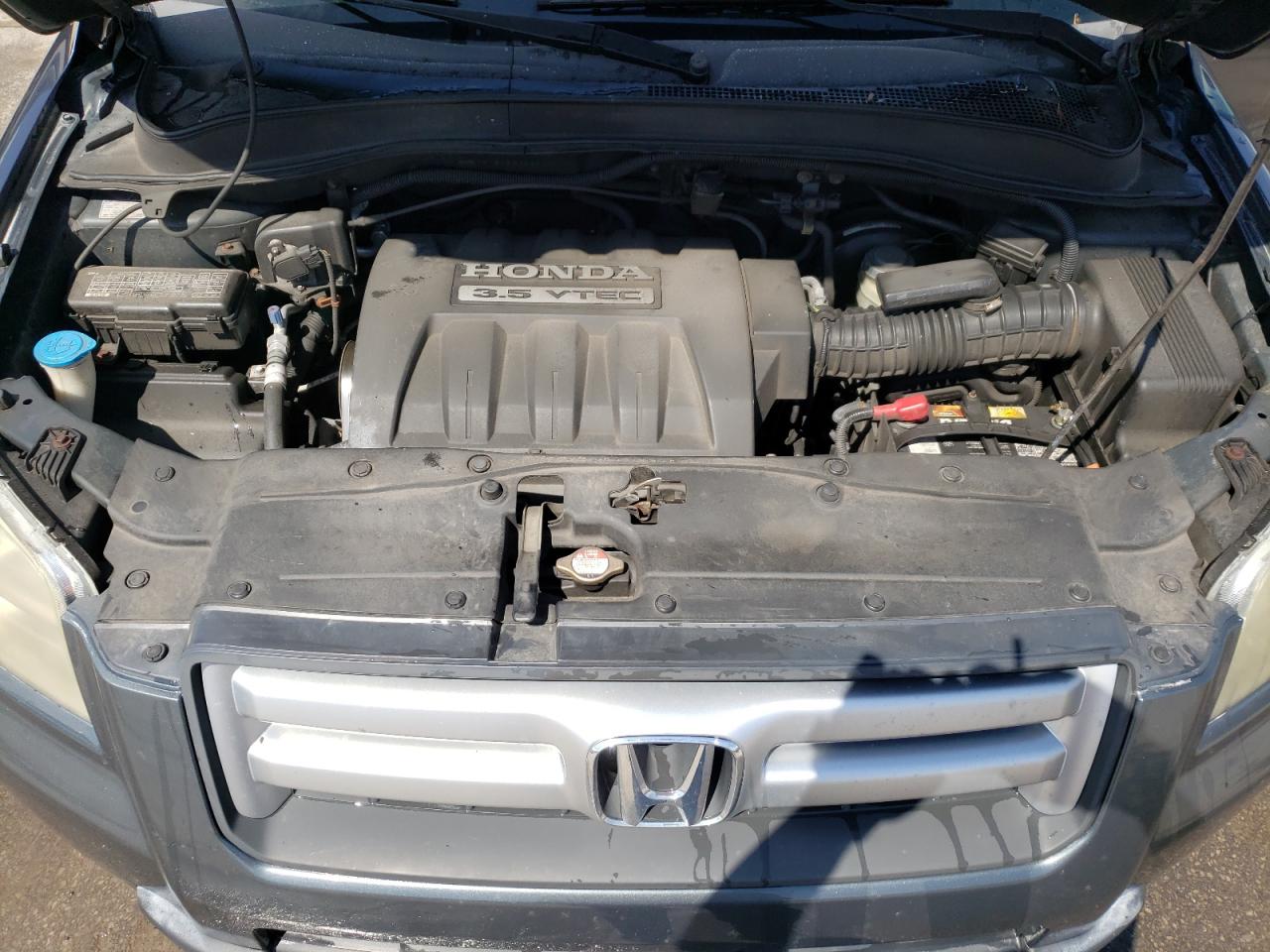 Photo 7 from auction – 2006 HONDA PILOT LX with VIN 2HKYF18156H554084