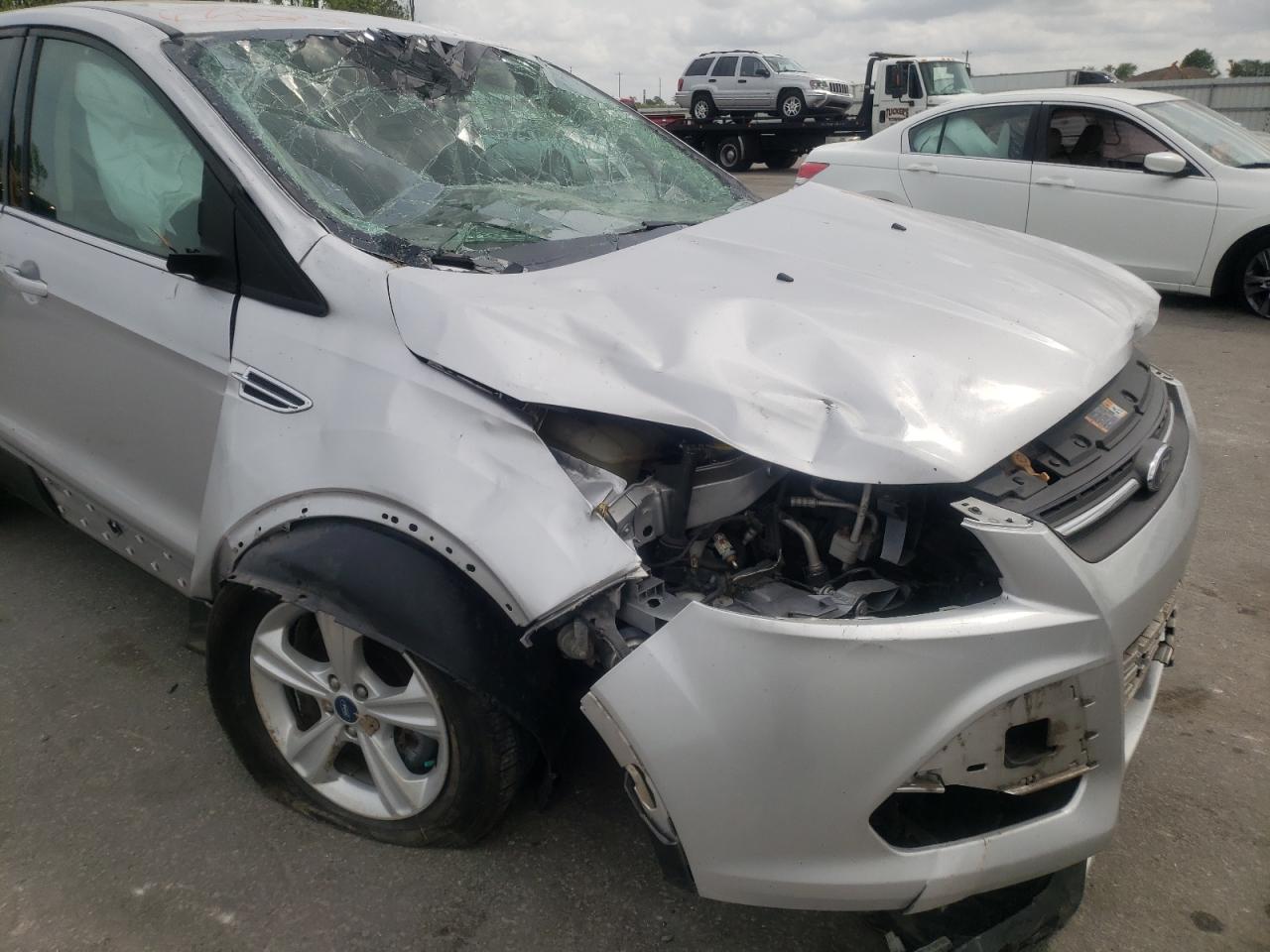 Photo 9 from auction – 2013 FORD ESCAPE SE with VIN 1FMCU9GX2DUB49951