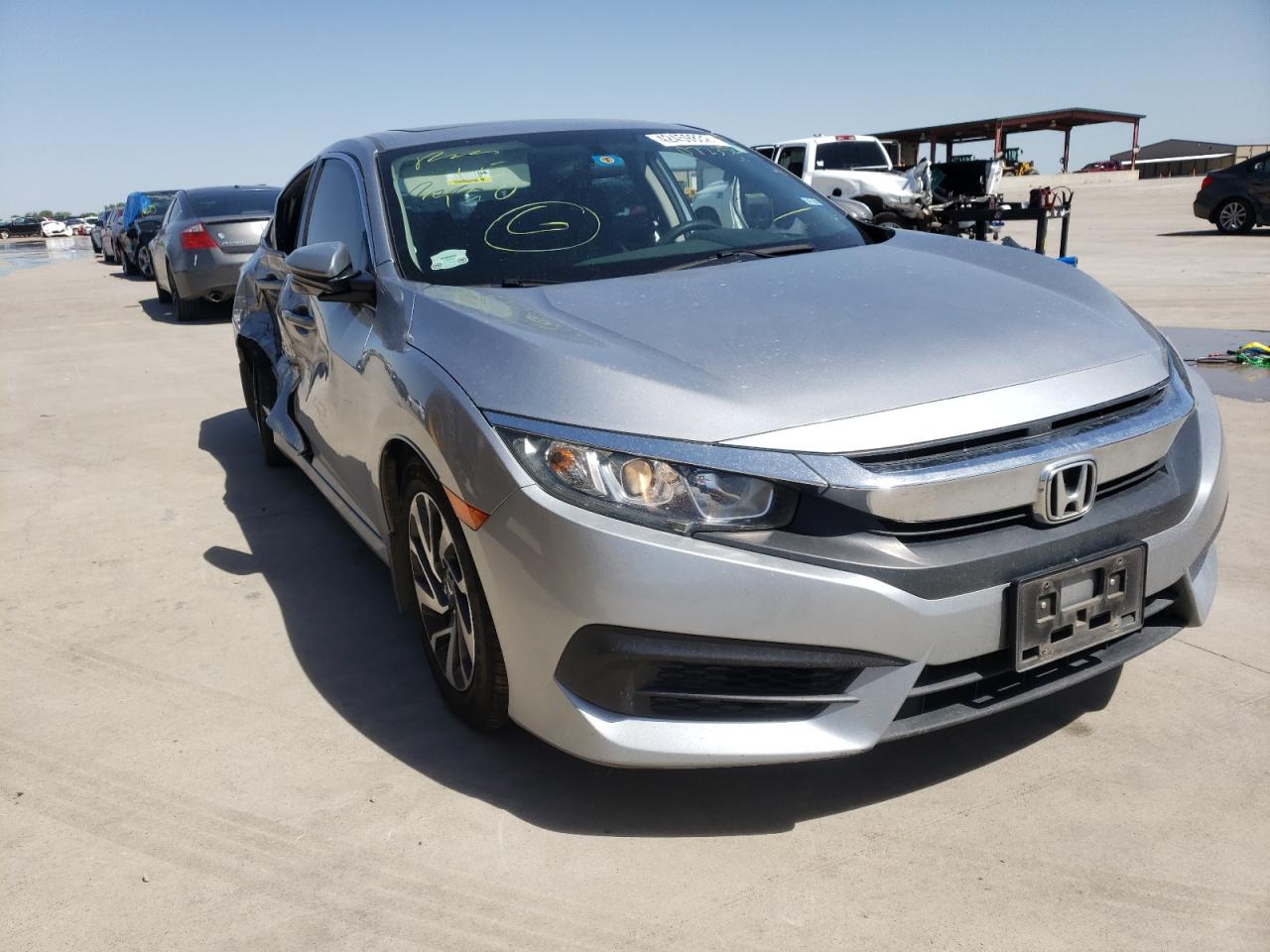HONDA CIVIC EX 2016 with VIN 19XFC2F70GE072352 - Photo from auction