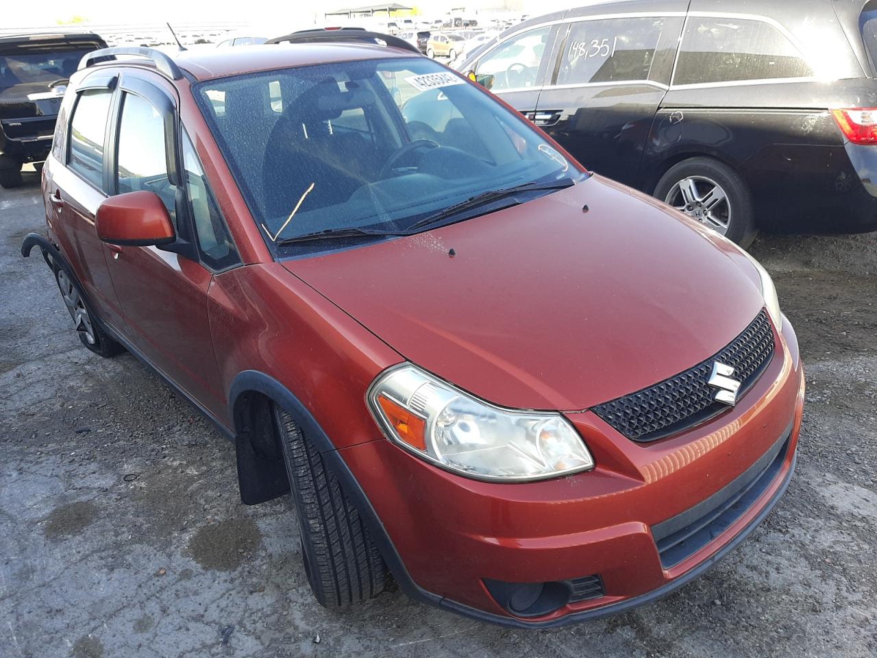 SUZUKI SX4 2011 with VIN JS2YB5A34B6302917 - Photo from auction