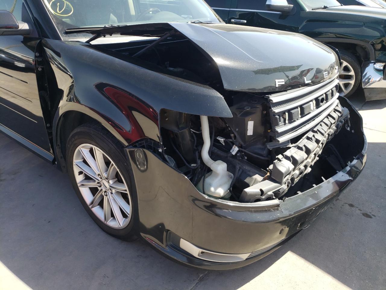 Photo 9 from auction – 2014 FORD FLEX LIMIT with VIN 2FMGK5D80EBD05232