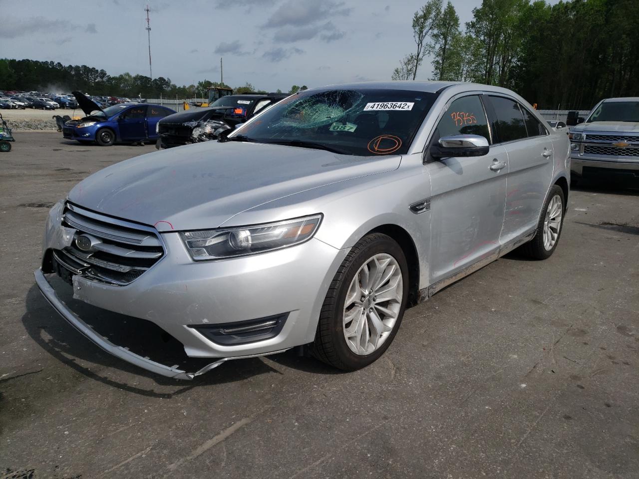 Photo 2 from auction – 2014 FORD TAURUS LIM with VIN 1FAHP2F8XEG179644