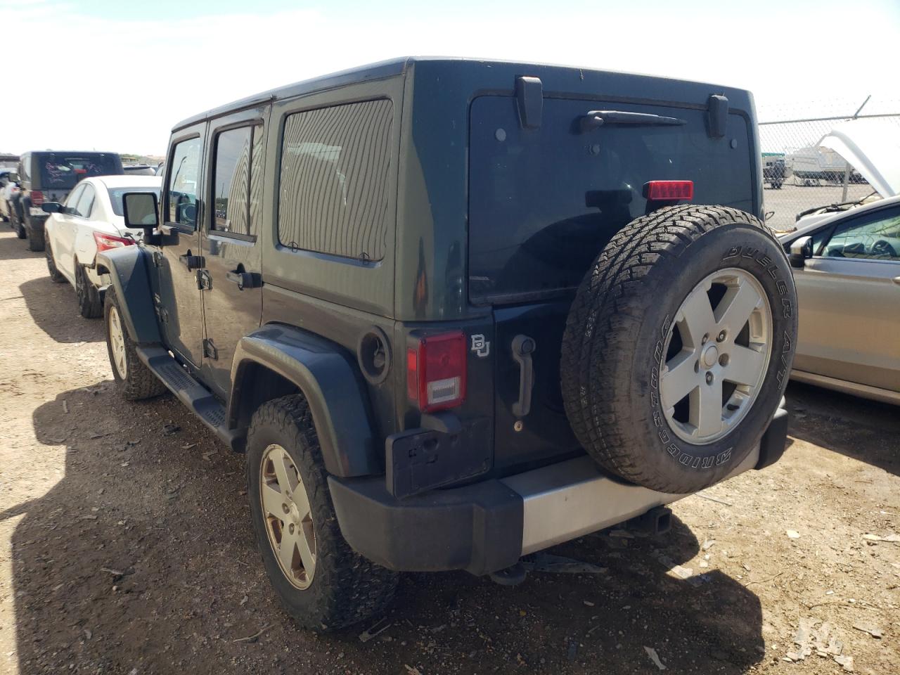 Photo 3 from auction – 2011 JEEP WRANGLER U with VIN 1J4HA5H14BL579225