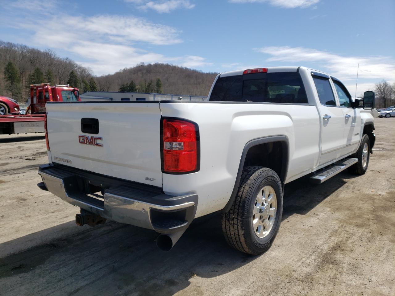 Photo 4 from auction – 2015 GMC SIERRA K35 with VIN 1GT423C83FF176643