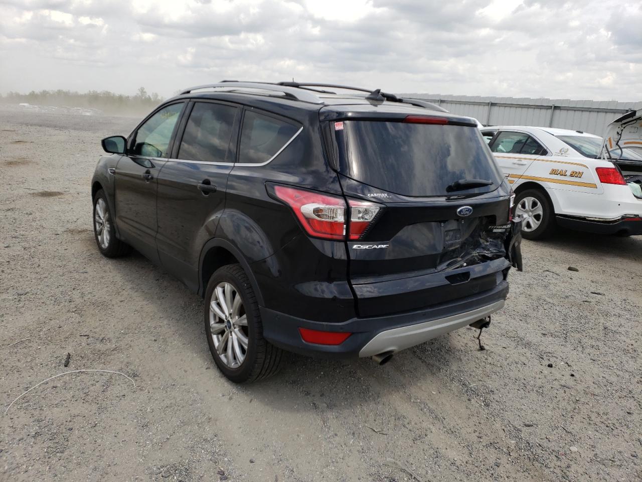 Photo 3 from auction – 2018 FORD ESCAPE TIT with VIN 1FMCU9J96JUA14607