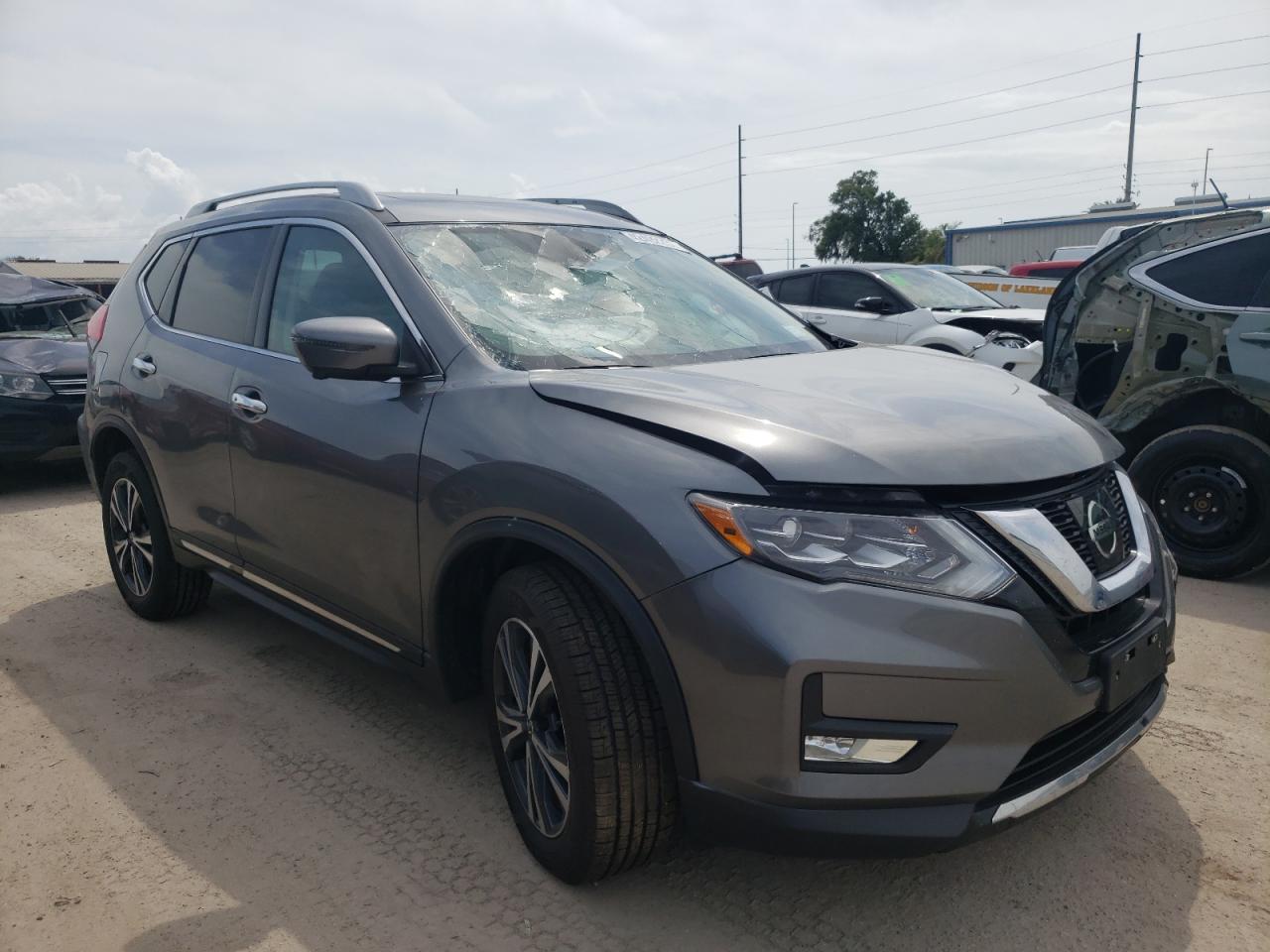 NISSAN ROGUE SV 2017 with VIN 5N1AT2MVXHC797862 - Photo from auction