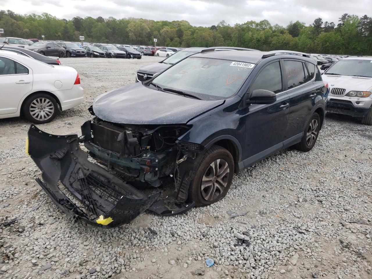 Photo 2 from auction – 2018 TOYOTA RAV4 LE with VIN JTMZFREVXJJ190822