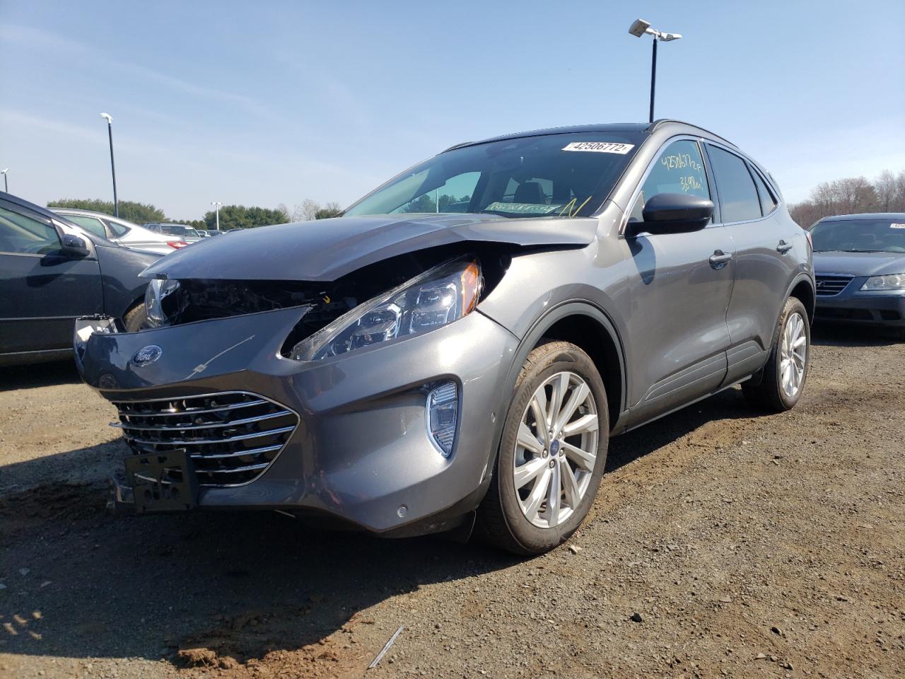 Photo 2 from auction – 2021 FORD ESCAPE TIT with VIN 1FMCU9J96MUA22131