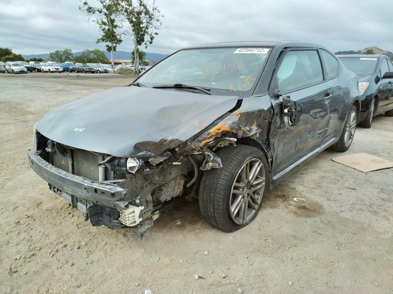 Photo 2 from auction – 2011 TOYOTA SCION TC with VIN JTKJF5C79B3007273