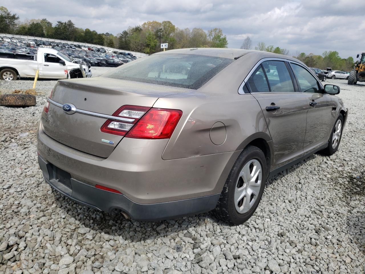 Photo 4 from auction – 2015 FORD TAURUS POL with VIN 1FAHP2MK0FG135698