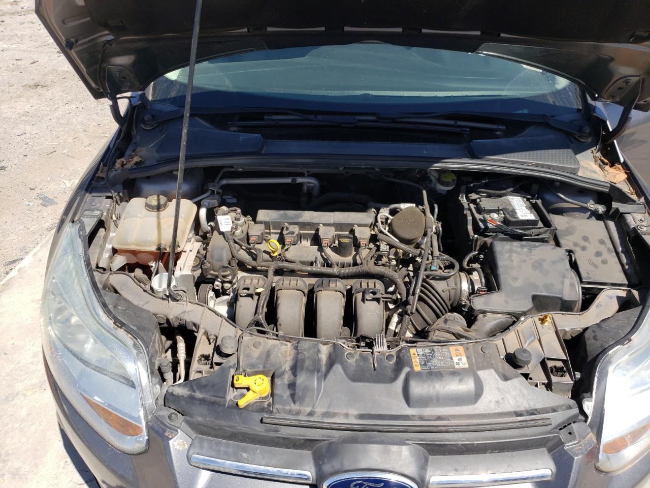 Photo 7 from auction – 2014 FORD FOCUS SE with VIN 1FADP3F21EL460495