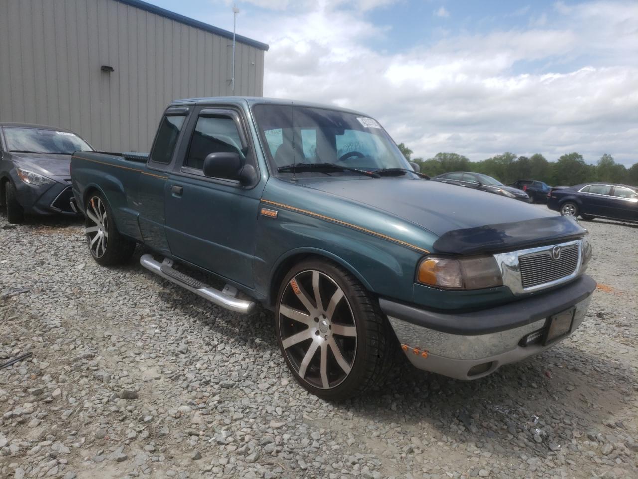 MAZDA B2500 CAB 2000 with VIN 4F4YR16C7YTM01708 - Photo from auction