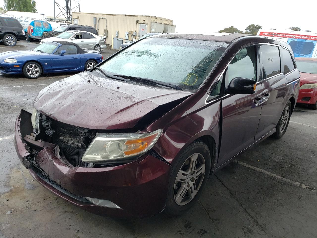 Photo 2 from auction – 2012 HONDA ODYSSEY TO with VIN 5FNRL5H91CB018835