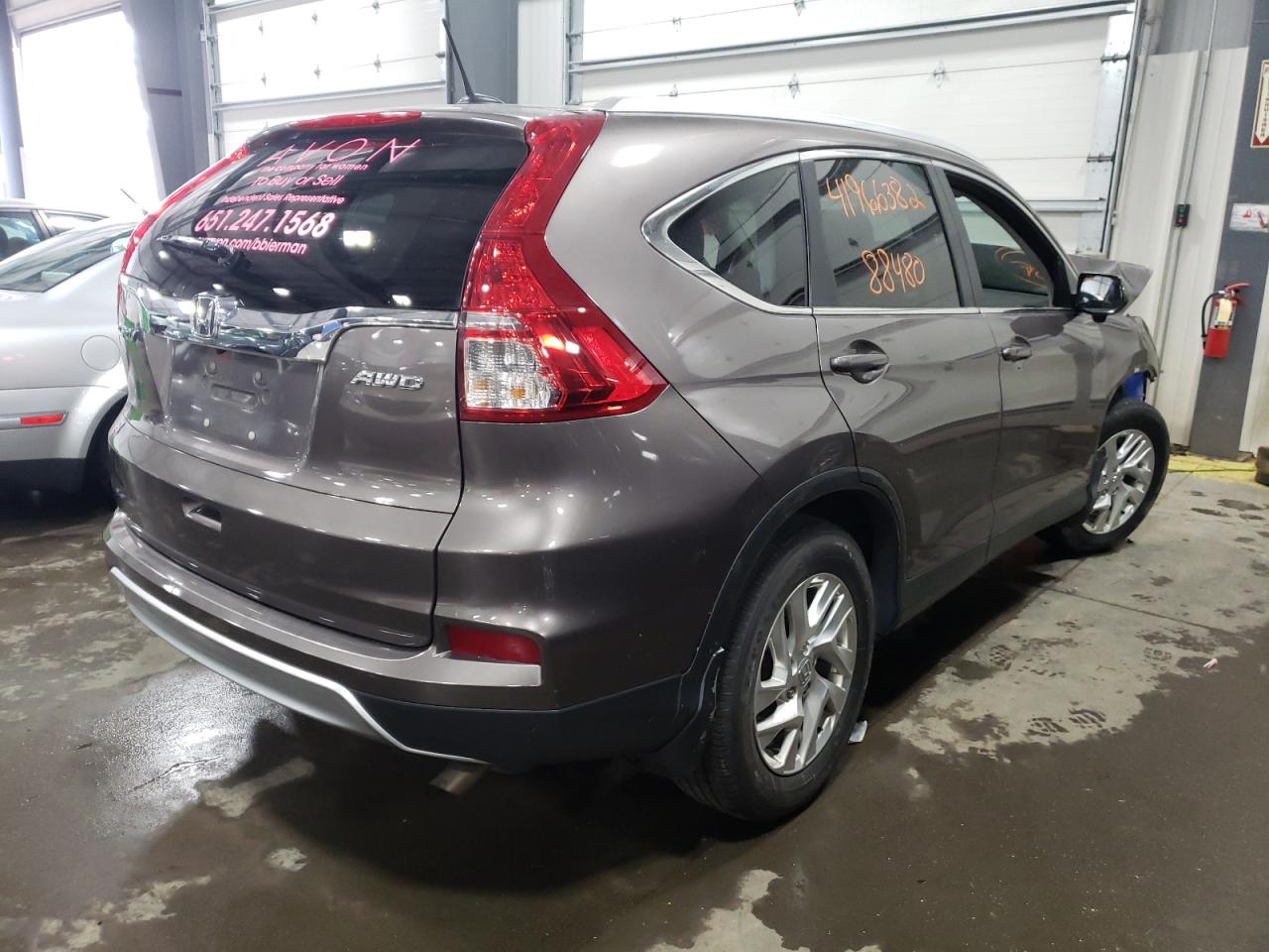 Photo 4 from auction – 2015 HONDA CR-V EXL with VIN 5J6RM4H72FL002757