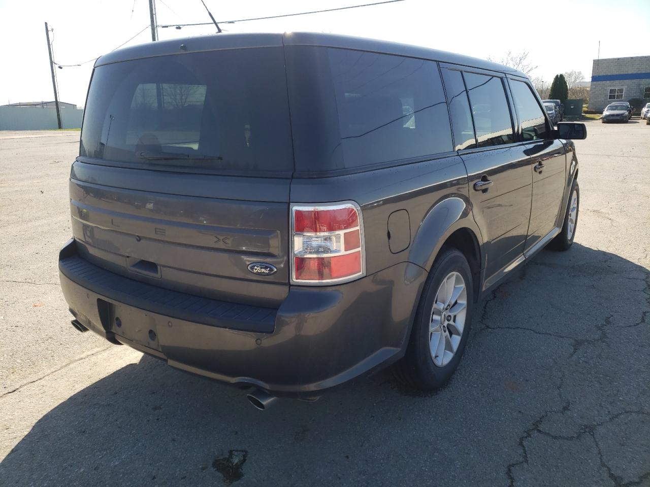 Photo 4 from auction – 2016 FORD FLEX SE with VIN 2FMGK5B85GBA13159