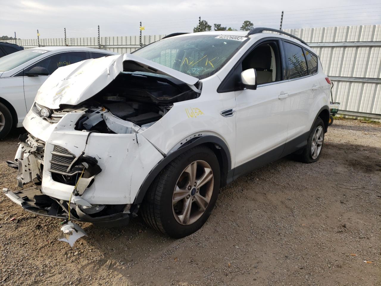 Photo 2 from auction – 2014 FORD ESCAPE SE with VIN 1FMCU9GX9EUE05102