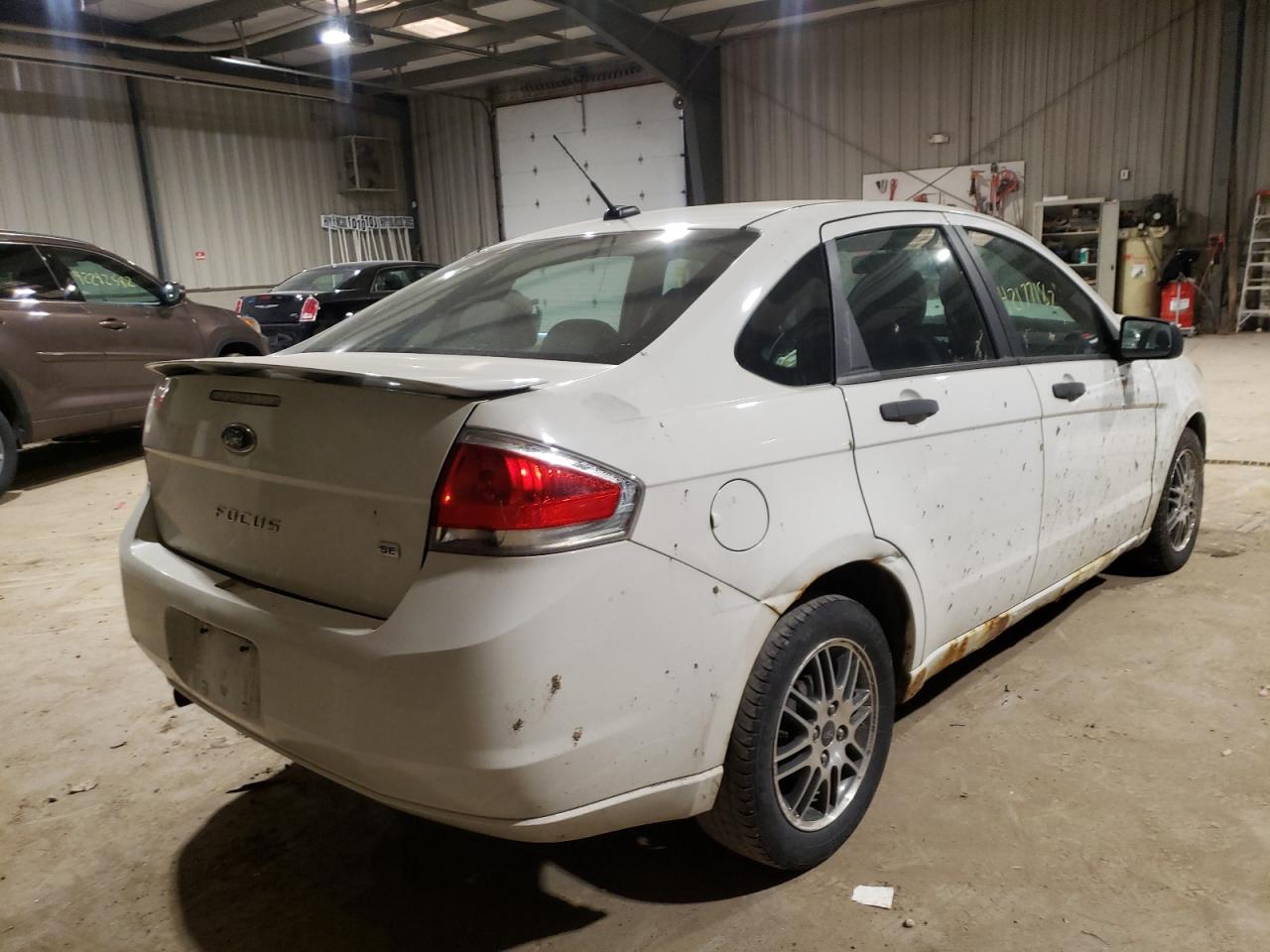 Photo 4 from auction – 2011 FORD FOCUS SE with VIN 1FAHP3FNXBW125354