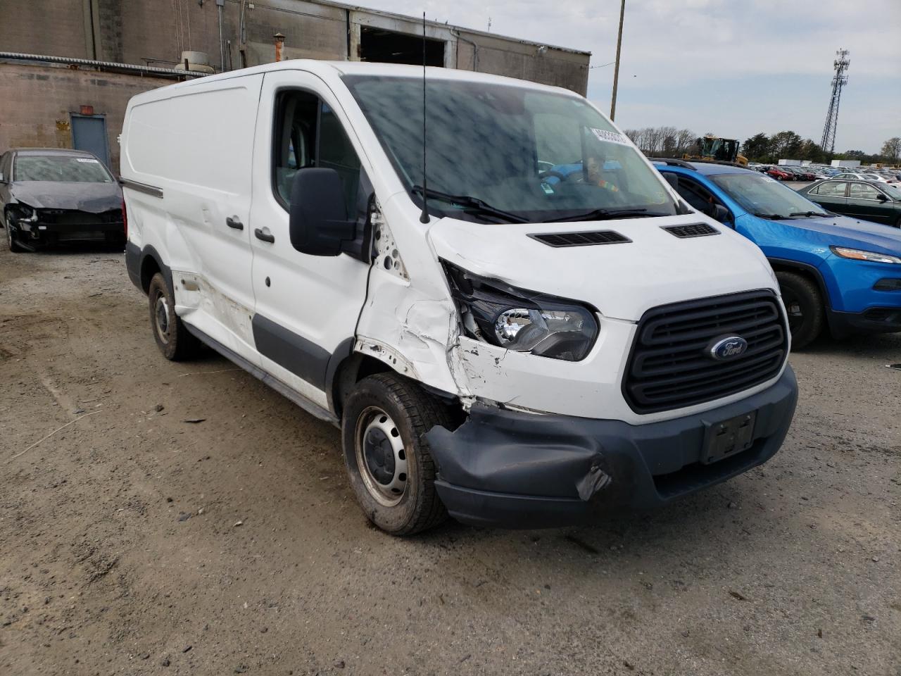 FORD TRANSIT T- 2015 with VIN 1FTNE1YM2FKB18214 - Photo from auction