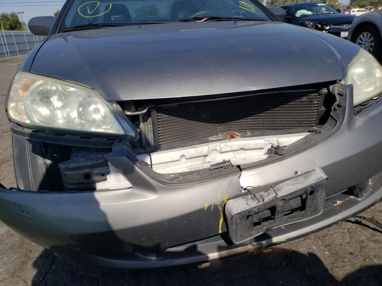Photo 9 from auction – 2005 HONDA CIVIC EX with VIN 1HGEM22945L028716