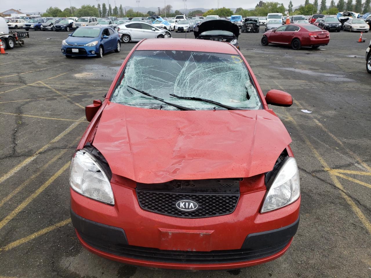 Photo 9 from auction – 2006 KIA RIO with VIN KNADE123766109087