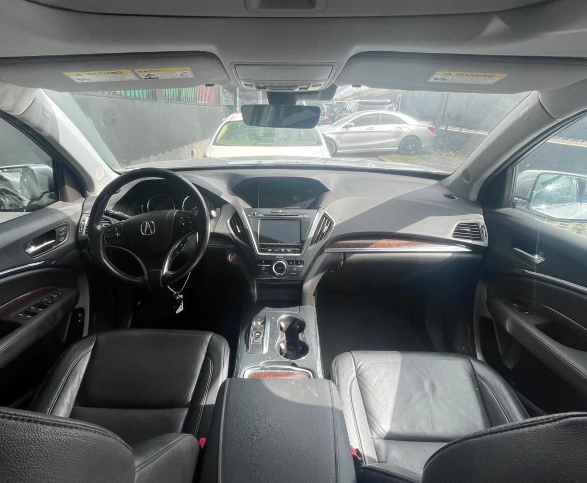 Photo 9 from auction – 2017 ACURA MDX with VIN 5FRYD3H33HB008077