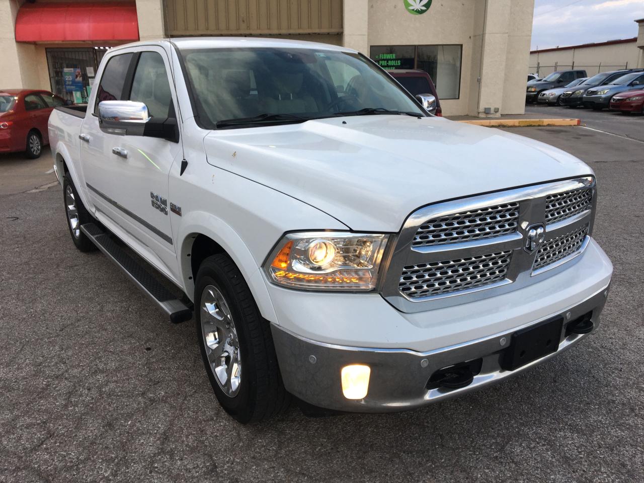 RAM 1500 LARAM 2018 with VIN 1C6RR7NT7JS173133 - Photo from auction