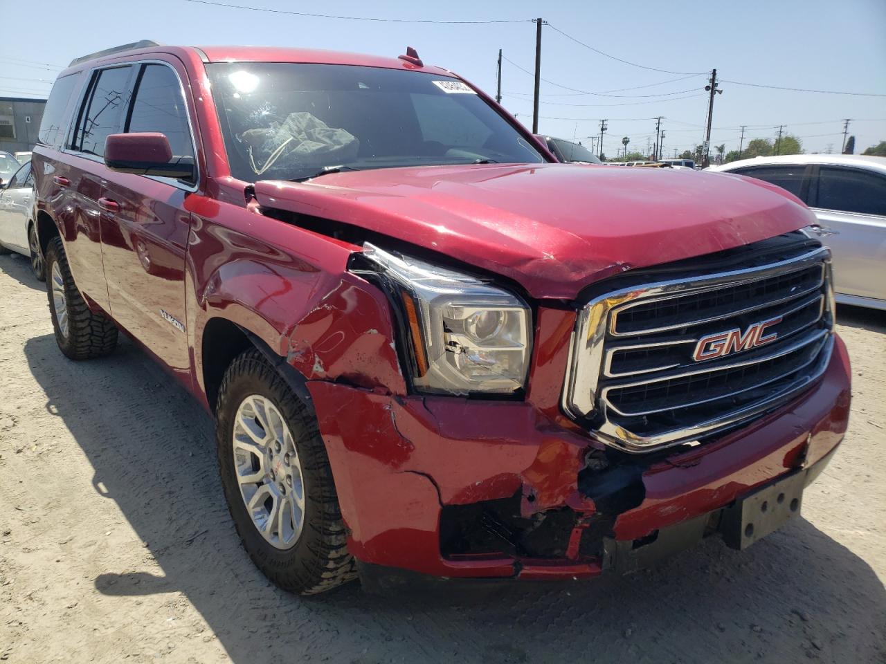 GMC YUKON SLT 2015 with VIN 1GKS2BKC6FR578392 - Photo from auction
