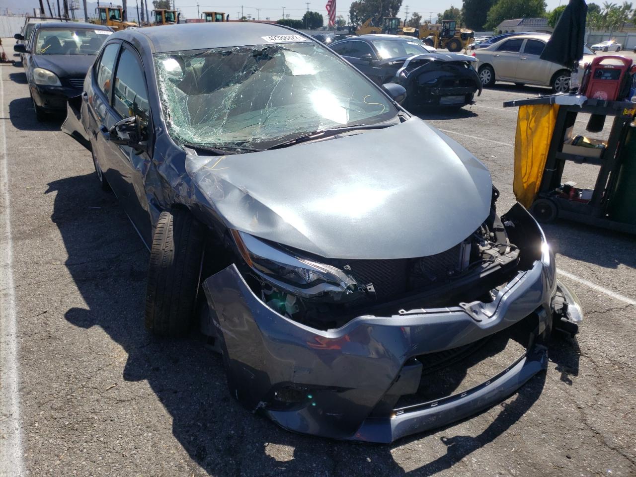 TOYOTA COROLLA L 2014 with VIN 5YFBURHE0EP090491 - Photo from auction