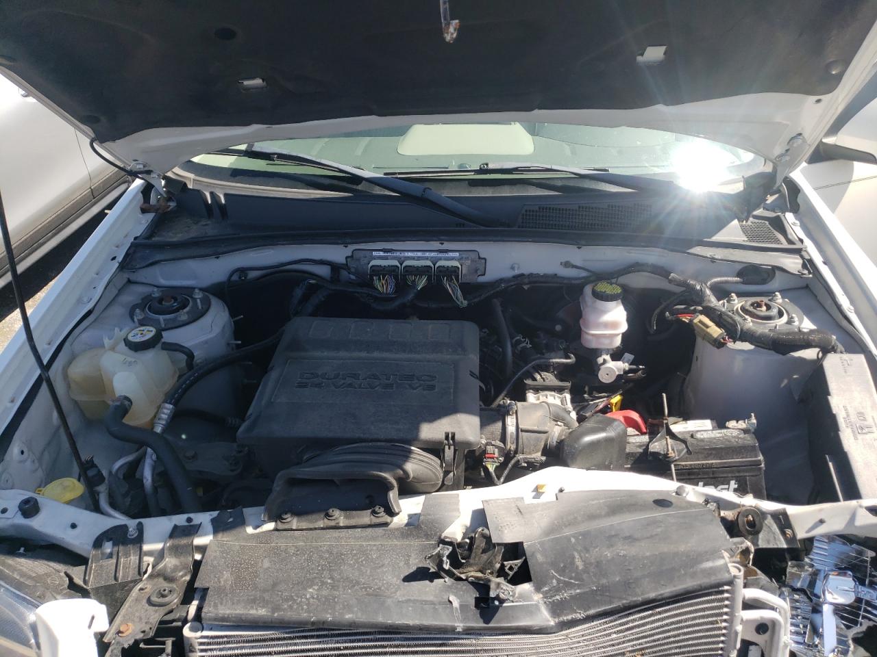 Photo 7 from auction – 2011 MERCURY MARINER PR with VIN 4M2CN9HG8BKJ08050