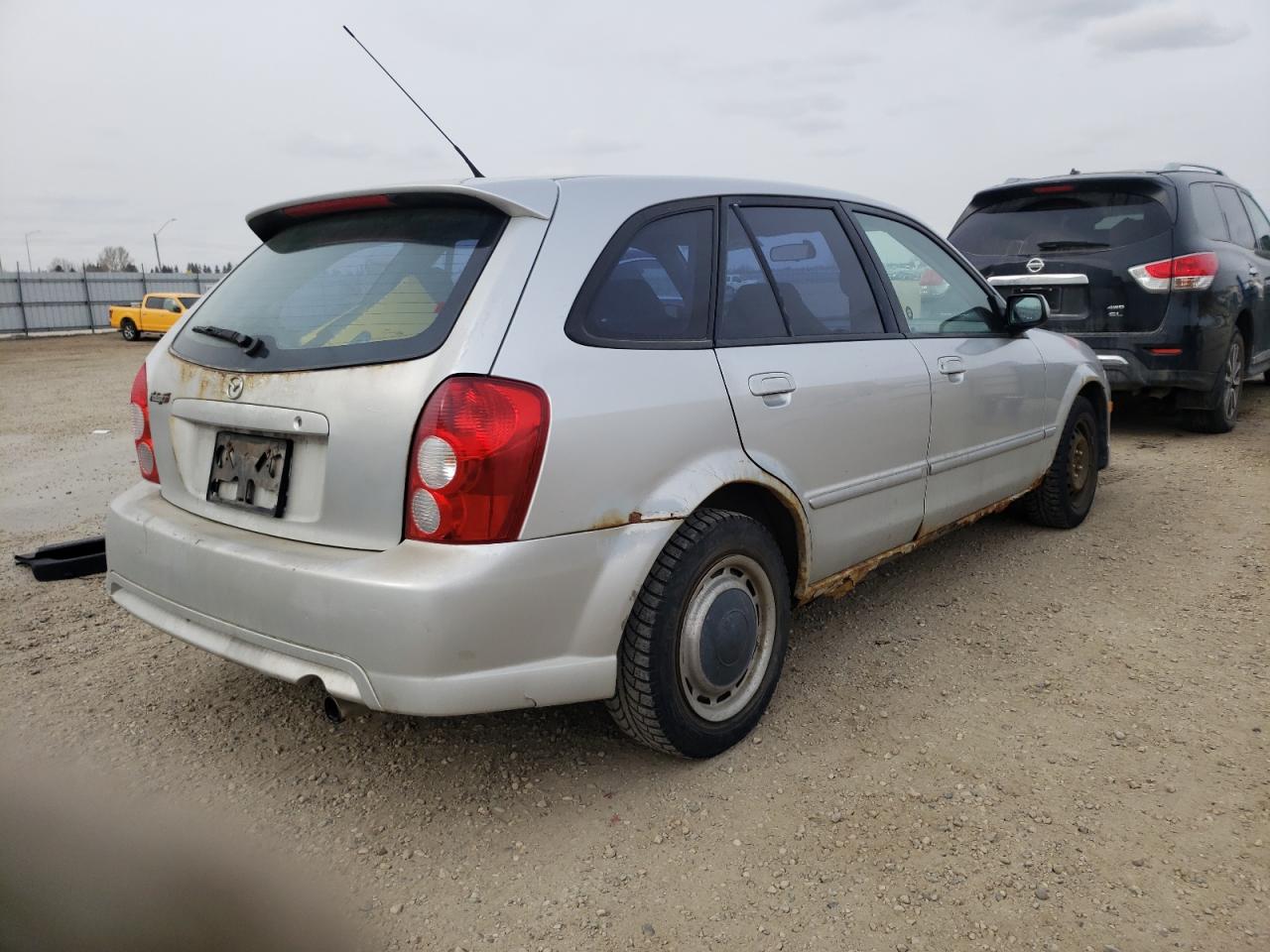 Photo 4 from auction – 2002 MAZDA PROTEGE PR with VIN JM1BJ245321595317