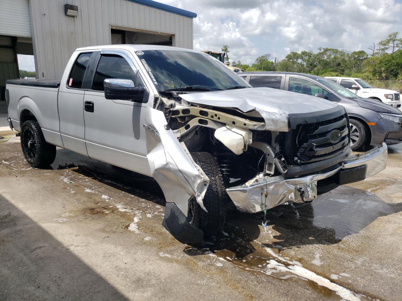 FORD F150 SUPER 2011 with VIN 1FTEX1CM2BFD03707 - Photo from auction