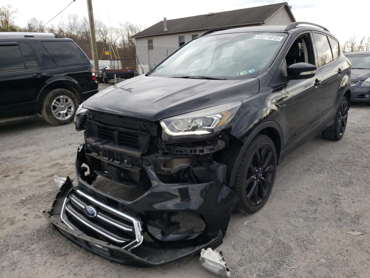 Photo 2 from auction – 2017 FORD ESCAPE TIT with VIN 1FMCU9J91HUA08093