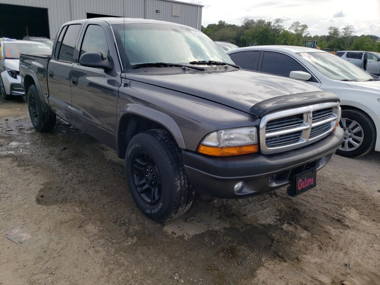 DODGE DAKOTA QUA 2004 with VIN 1D7HL38K34S742474 - Photo from auction
