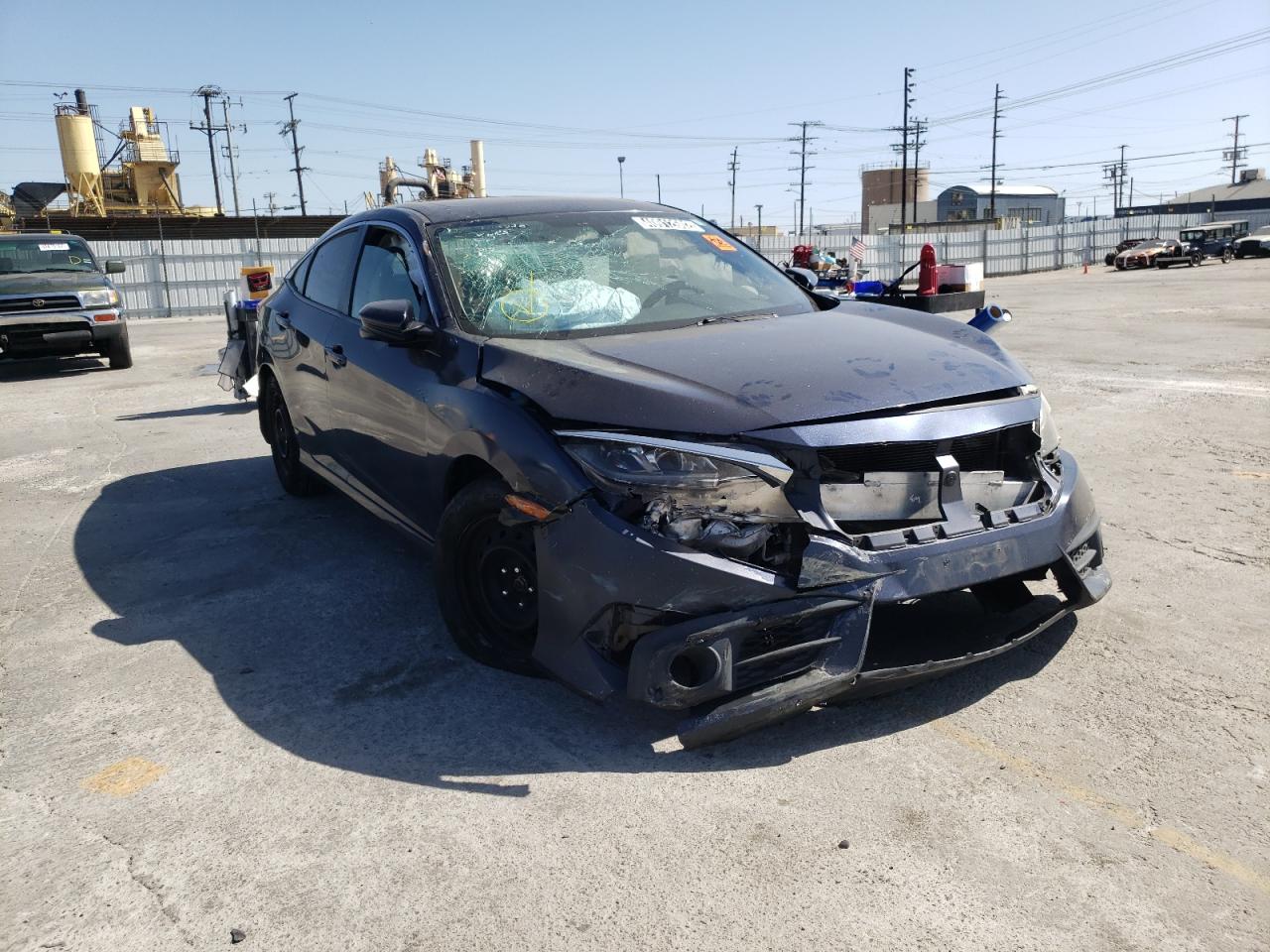 HONDA CIVIC EX 2017 with VIN 19XFC1F32HE205427 - Photo from auction