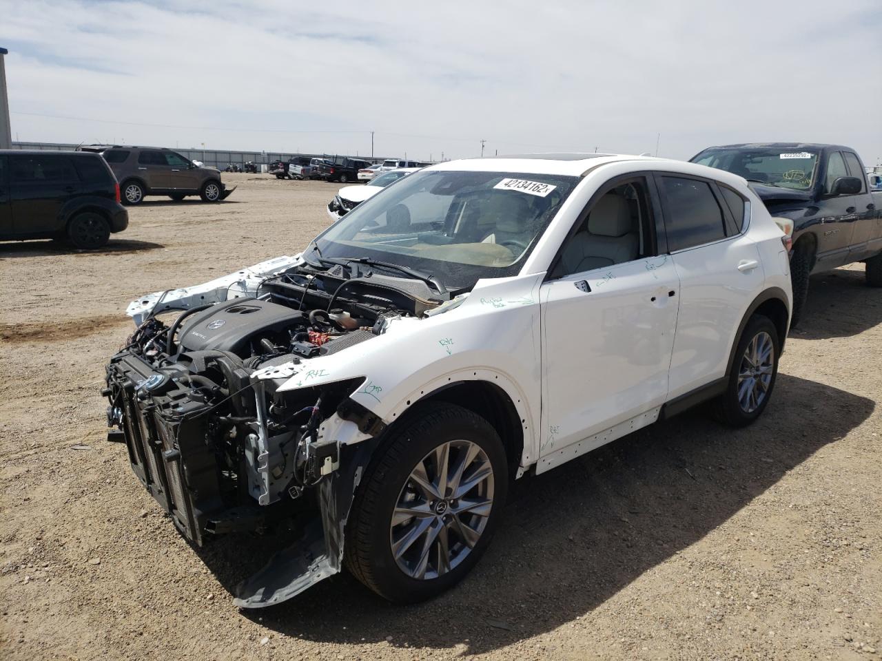 Photo 2 from auction – 2021 MAZDA CX-5 GRAND with VIN JM3KFBDMXM1456658