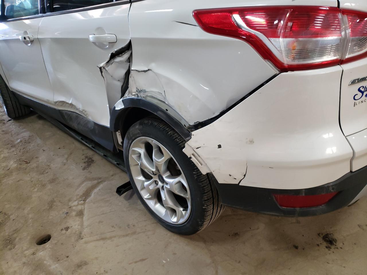 Photo 9 from auction – 2015 FORD ESCAPE TIT with VIN 1FMCU9J99FUB94253