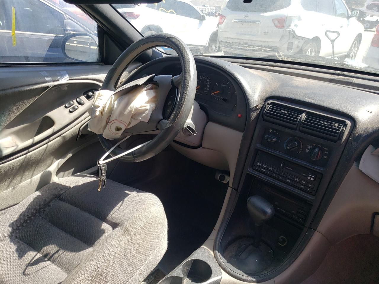 Photo 9 from auction – 1998 FORD MUSTANG with VIN 1FAFP4047WF231621