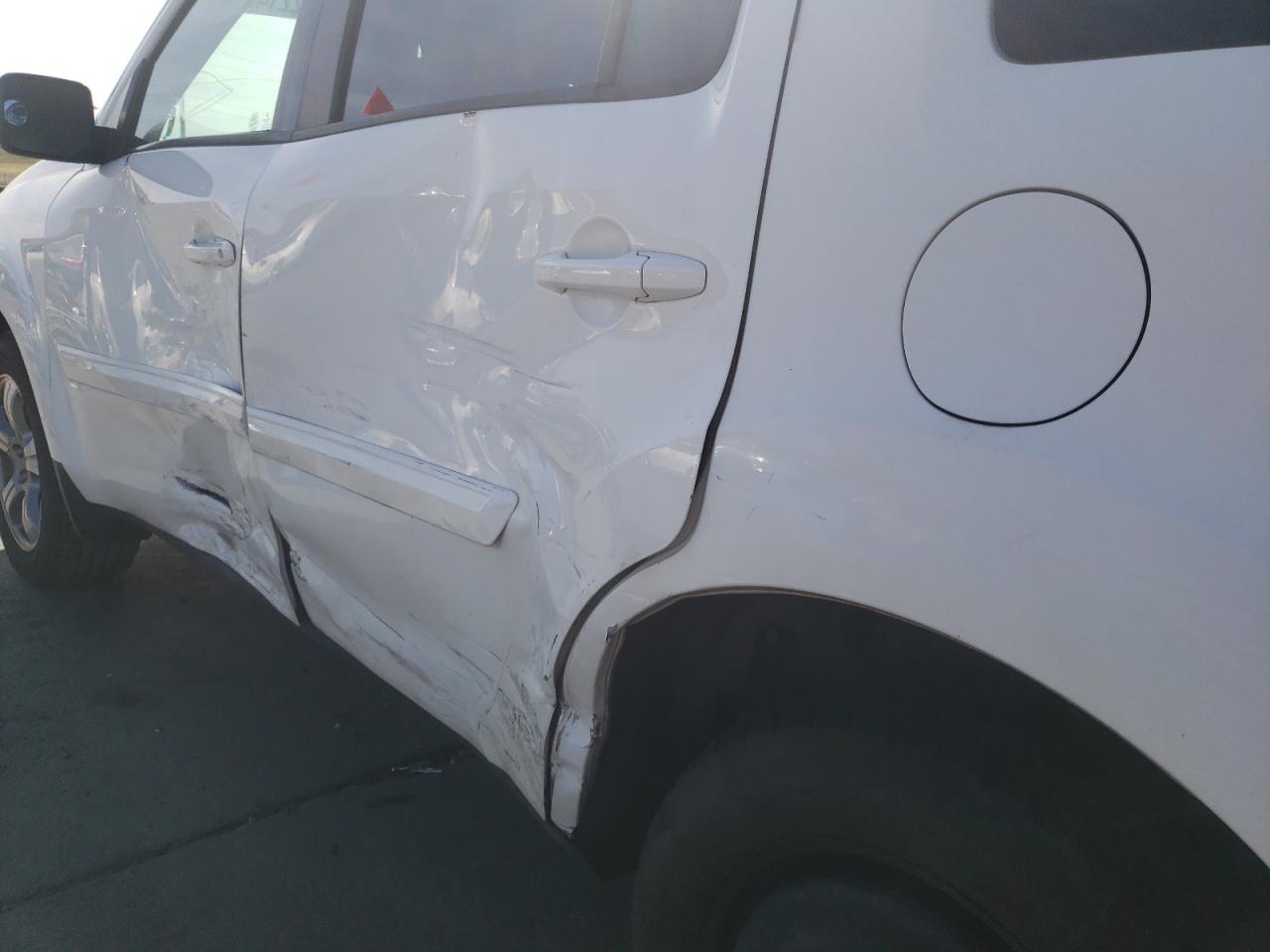 Photo 9 from auction – 2015 HONDA PILOT EXL with VIN 5FNYF4H59FB063407
