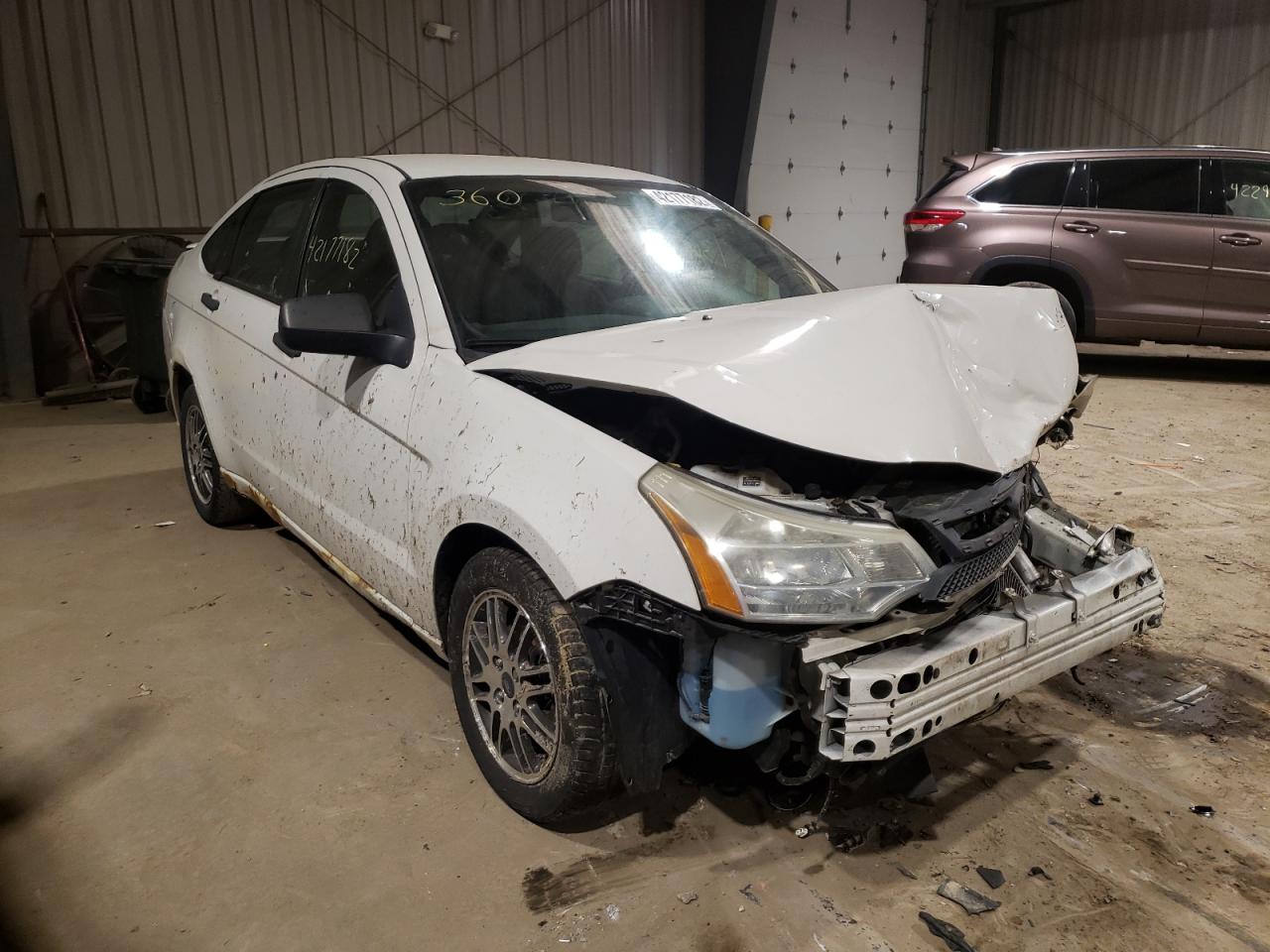 FORD FOCUS SE 2011 with VIN 1FAHP3FNXBW125354 - Photo from auction