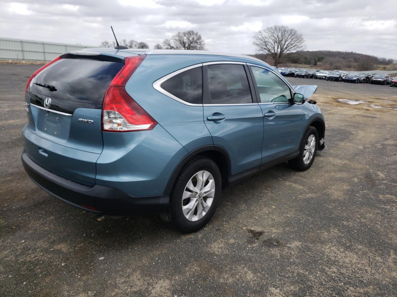 Photo 4 from auction – 2014 HONDA CR-V EXL with VIN 2HKRM4H73EH721735
