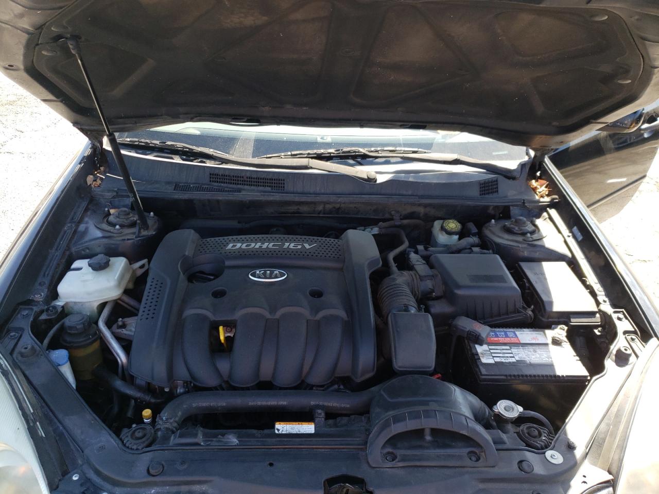 Photo 7 from auction – 2007 KIA OPTIMA LX with VIN KNAGE123075128682