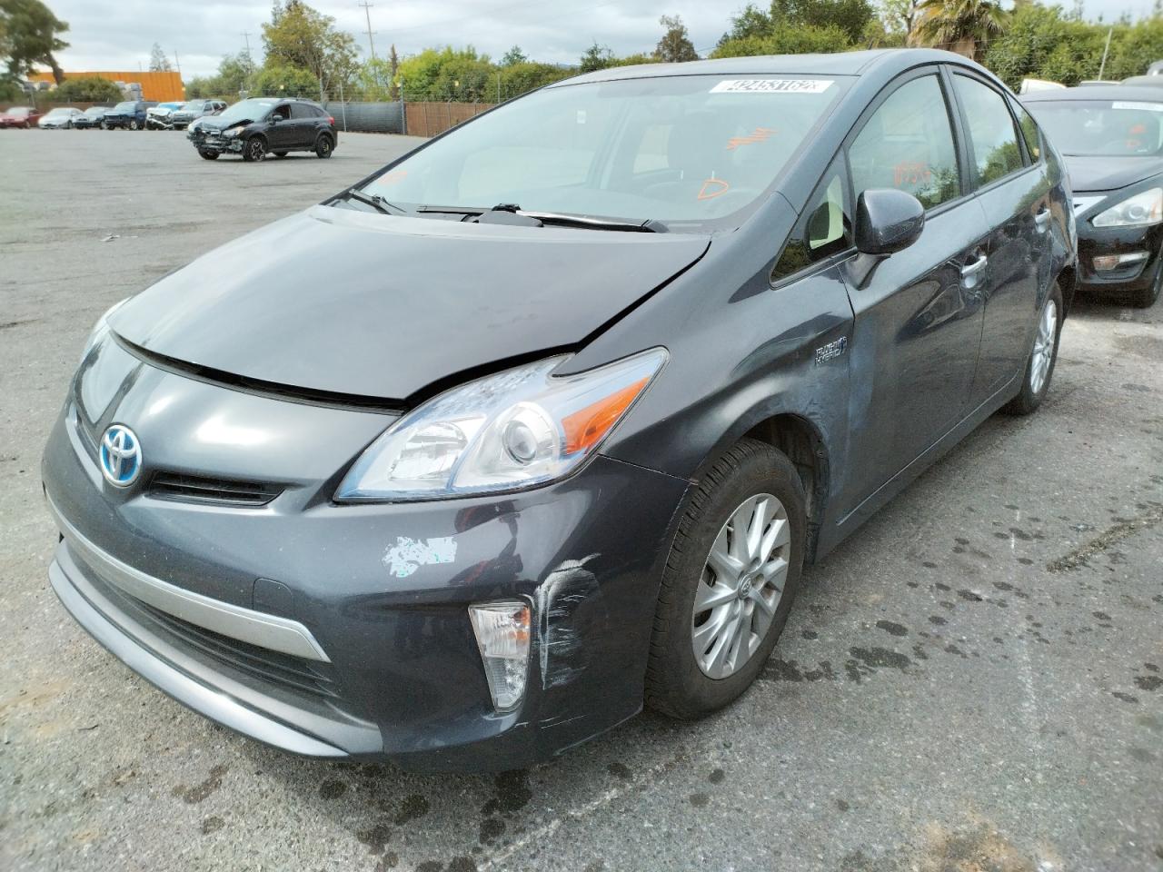 Photo 2 from auction – 2014 TOYOTA PRIUS PLUG with VIN JTDKN3DP4E3055690