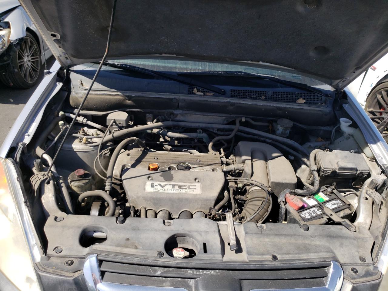 Photo 7 from auction – 2004 HONDA CR-V LX with VIN JHLRD68424C023566