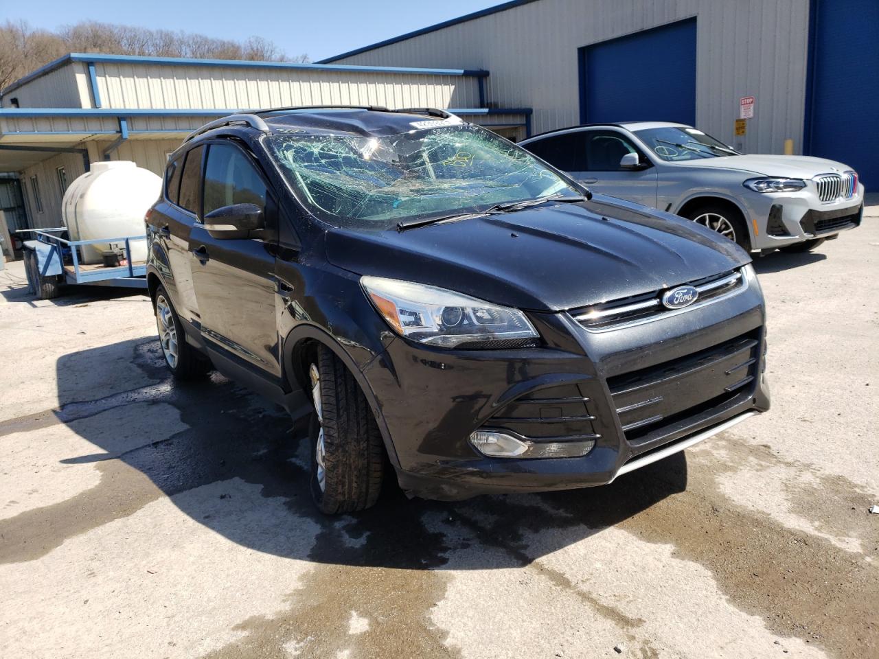 FORD ESCAPE TIT 2014 with VIN 1FMCU9JXXEUD99321 - Photo from auction