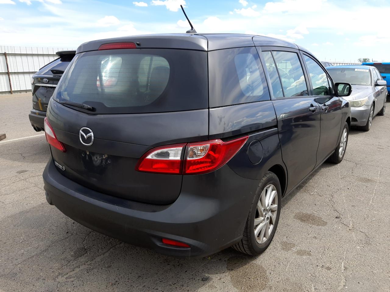 Photo 4 from auction – 2015 MAZDA 5 SPORT with VIN JM1CW2BL0F0181687