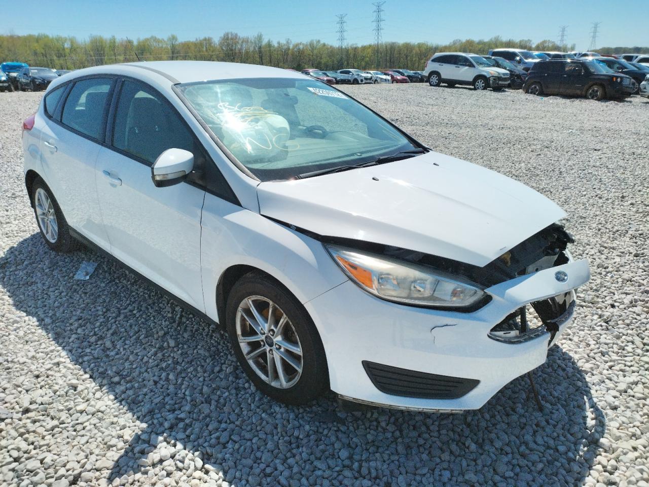 FORD FOCUS SE 2015 with VIN 1FADP3K2XFL273358 - Photo from auction