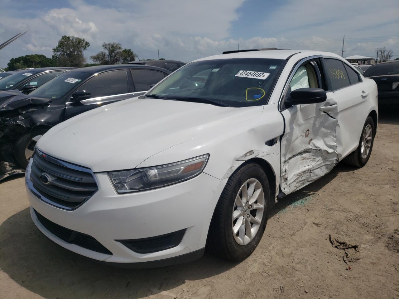 Photo 2 from auction – 2014 FORD TAURUS SE with VIN 1FAHP2D87EG115810