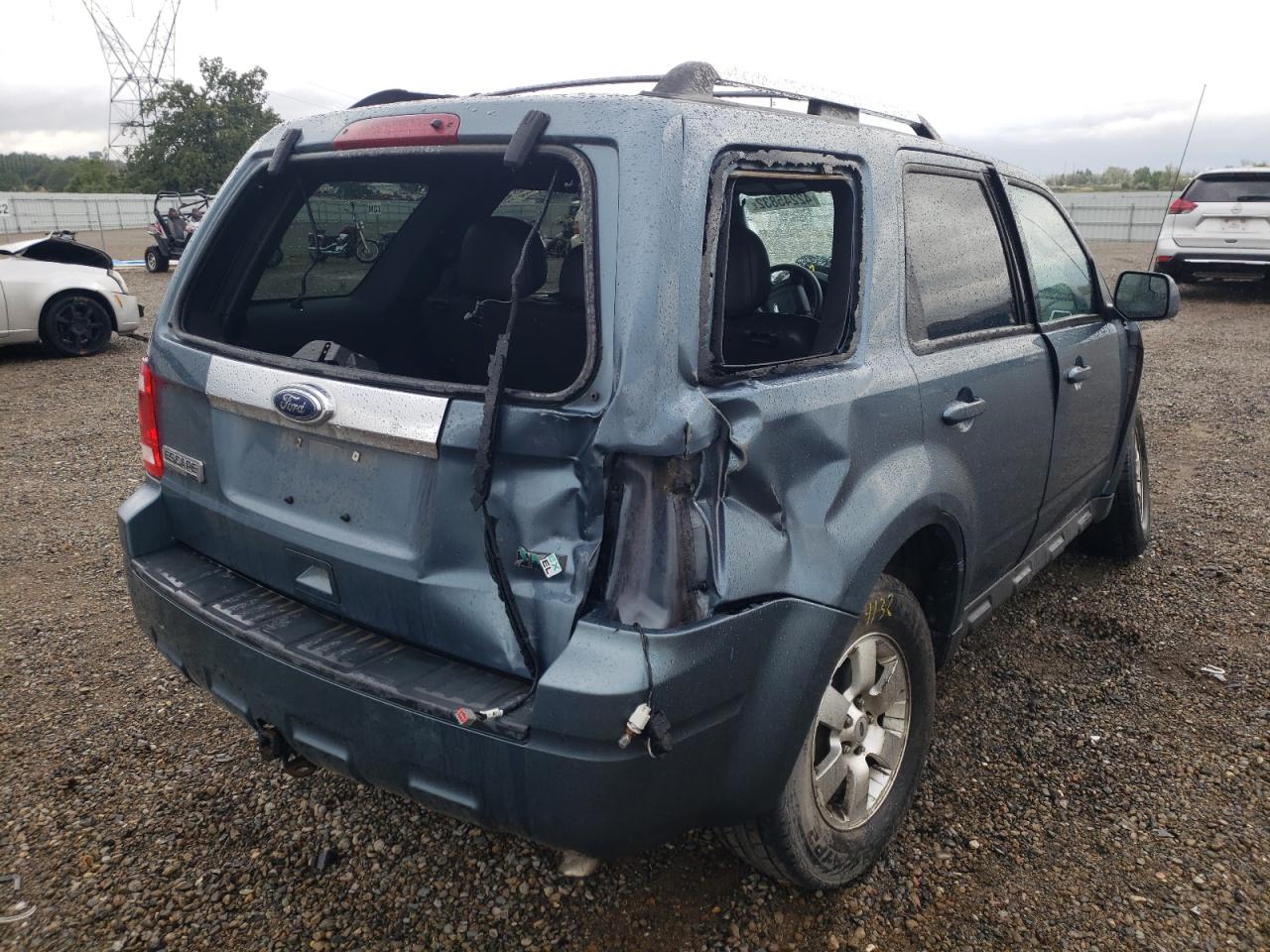 Photo 4 from auction – 2011 FORD ESCAPE LIM with VIN 1FMCU0EG6BKB98464