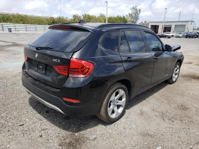 Photo 4 from auction – 2015 BMW X1 SDRIVE2 with VIN WBAVM1C54FV317652
