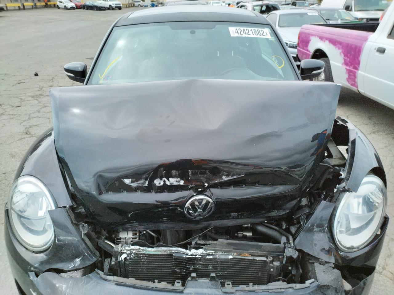 Photo 7 from auction – 2012 VOLKSWAGEN BEETLE with VIN 3VWJP7AT0CM646039